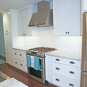 Transitional White Kitchen with Unique Storage Displays