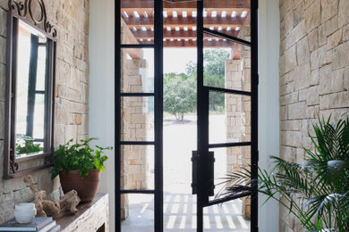 Inspiration for a transitional entryway remodel in Austin