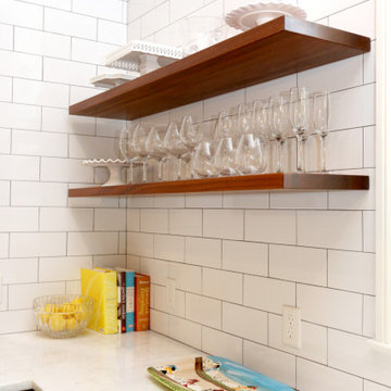 Open shelving and exposed brick are among the many details that encompass the si