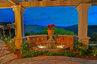 Example of a tuscan patio design in Orange County