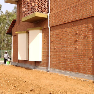 Inspiration for a modern home office and library in Bengaluru.