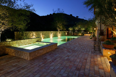 Inspiration for a mediterranean pool remodel in Orange County