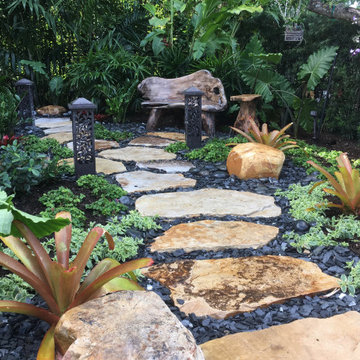 Stepping stone walkway tropical landscaping