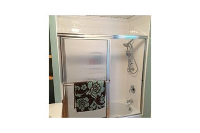 Sliding shower door - traditional master white tile and ceramic tile sliding shower door idea in Other