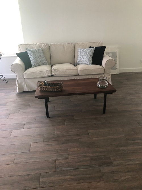 What Color Rug With Medium Dark Floor And Beige Sofa