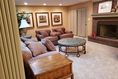 Mid-sized elegant formal and open concept carpeted and gray floor living room photo in Indianapolis with beige walls, a standard fireplace, a brick fireplace and no tv