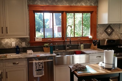 This is an example of a farmhouse kitchen in Milwaukee.