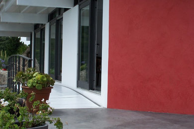 Idée de décoration pour une terrasse design.