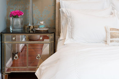 Example of a transitional master bedroom design in DC Metro with green walls