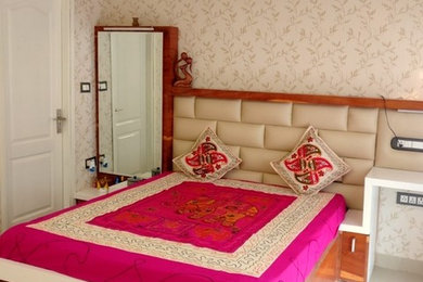 Example of an asian bedroom design in Other
