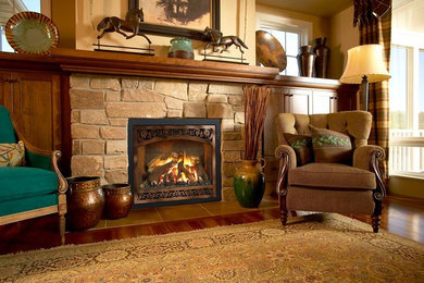 Inspiration for a mid-sized southwestern formal and open concept dark wood floor and brown floor living room remodel in Detroit with brown walls, a standard fireplace, a stone fireplace and no tv