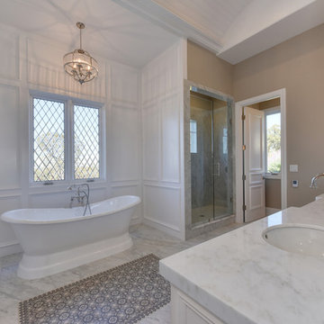 Freestanding tub and antique tile in the master bathroom.