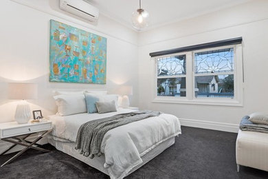Design ideas for a transitional bedroom in Melbourne.