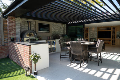 Design ideas for a modern patio in Essex.