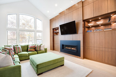 Minimalist open concept white floor living room photo in Salt Lake City with white walls, a hanging fireplace, a metal fireplace and a wall-mounted tv