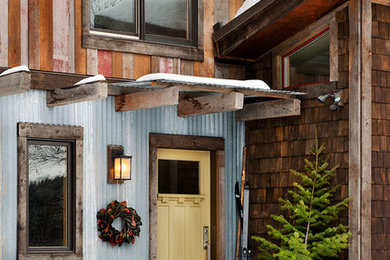 Mid-sized mountain style entryway photo in Other