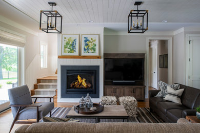 Mid-sized farmhouse formal and open concept medium tone wood floor, brown floor and shiplap ceiling living room photo in Minneapolis with beige walls, a standard fireplace, a shiplap fireplace and a media wall