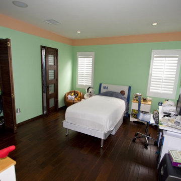 Kids Bedroom With Green Walls and Plantation Shutters