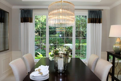Example of a mid-sized transitional carpeted and beige floor kitchen/dining room combo design in Phoenix with gray walls and no fireplace