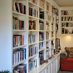 Medium sized victorian home office and library in Melbourne with a reading nook.
