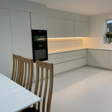 Modern white handleless kitchen