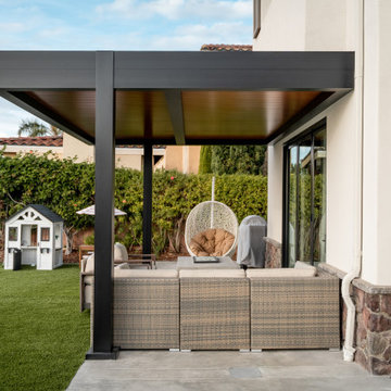 Residential: Attached Black Patio Cover with Wood Grain Panels in San Diego, CA