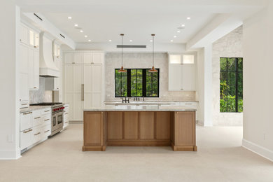 Large elegant eat-in kitchen photo in Miami with flat-panel cabinets, white cabinets and two islands