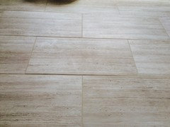 Acceptable to get uneven floor tiles in a remodel job?
