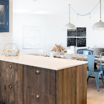 Industrial Rustic kitchen with doors made from 100 year old Reclaimed wood.