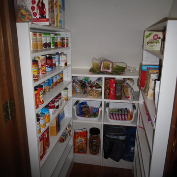 Under the stairs pantry!  Wasted space?  Think again!