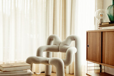 Example of a small minimalist family room design in Other