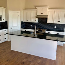 Whit Kitchen & Black Counters