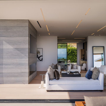 Contemporary Fireplace installation with Ocean Views