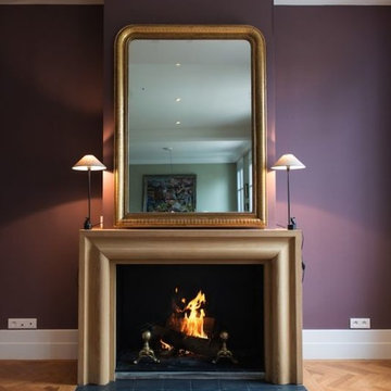 Cheminée avec entourage en bois de châtaignier sur mesure