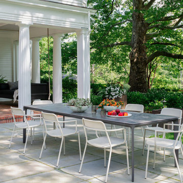 Modern Outdoor Dining on Bluestone Patio at Historic Concord Home