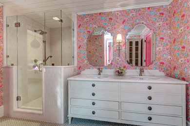 Inspiration for a timeless kids' ceramic tile, blue floor, double-sink, wood ceiling and wallpaper alcove shower remodel in Charlotte with flat-panel cabinets, white cabinets, multicolored walls, an undermount sink, marble countertops, a hinged shower door, white countertops and a freestanding vanity