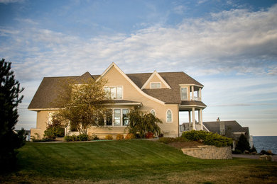 Example of a classic exterior home design in Portland Maine