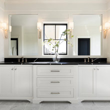 Cabin master bathroom mirrors