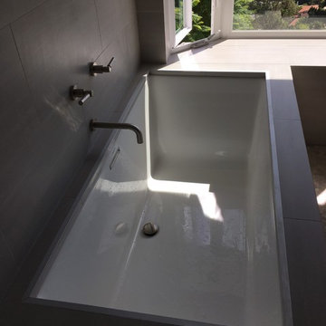 Overhead Detail of Rectangular Tub With Wall Mount Faucet