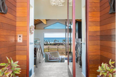 Inspiration for a coastal entryway remodel in San Diego
