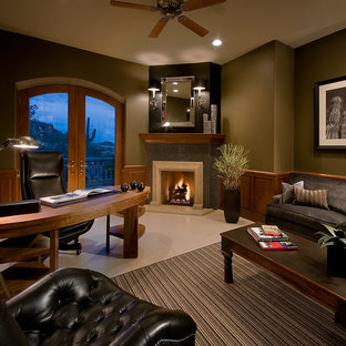 Design ideas for a contemporary home office in Phoenix with green walls, a corner fireplace, a tile fireplace surround and a freestanding desk.