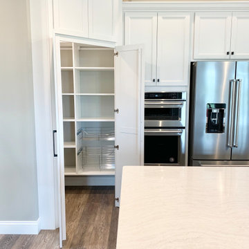Open Concept Kitchen With Large Island in New Build by Hazelwood Homes (Geneseo,