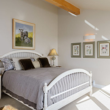 The first floor master bedroom is large, filled with light and ocean views.