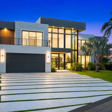 STAGGERED DESIGNER CONCRETE SLABS DRIVEWAY & FLOATING PORCH