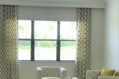 Minimalist family room photo in Tampa