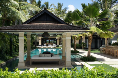 Patio kitchen - huge tropical backyard tile patio kitchen idea in Hawaii with a gazebo