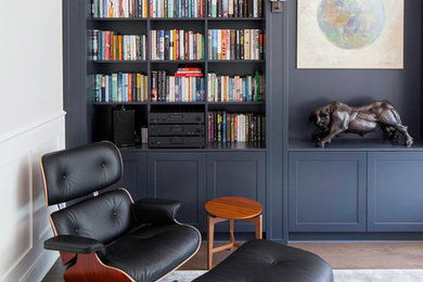 Photo of a traditional home office in Cambridgeshire with white walls and dark hardwood flooring.