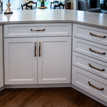 White Kitchen with Black Range Hood and Taj Royale quartz Countertops