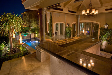 Design ideas for a large traditional backyard patio in Orange County with an outdoor kitchen and a gazebo/cabana.