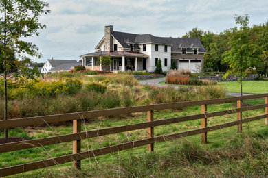 Example of a beach style home design design in Boston